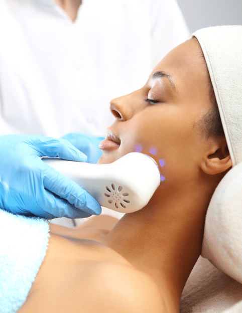 Light acne treatment, the woman in the beauty salon | Light Therapy